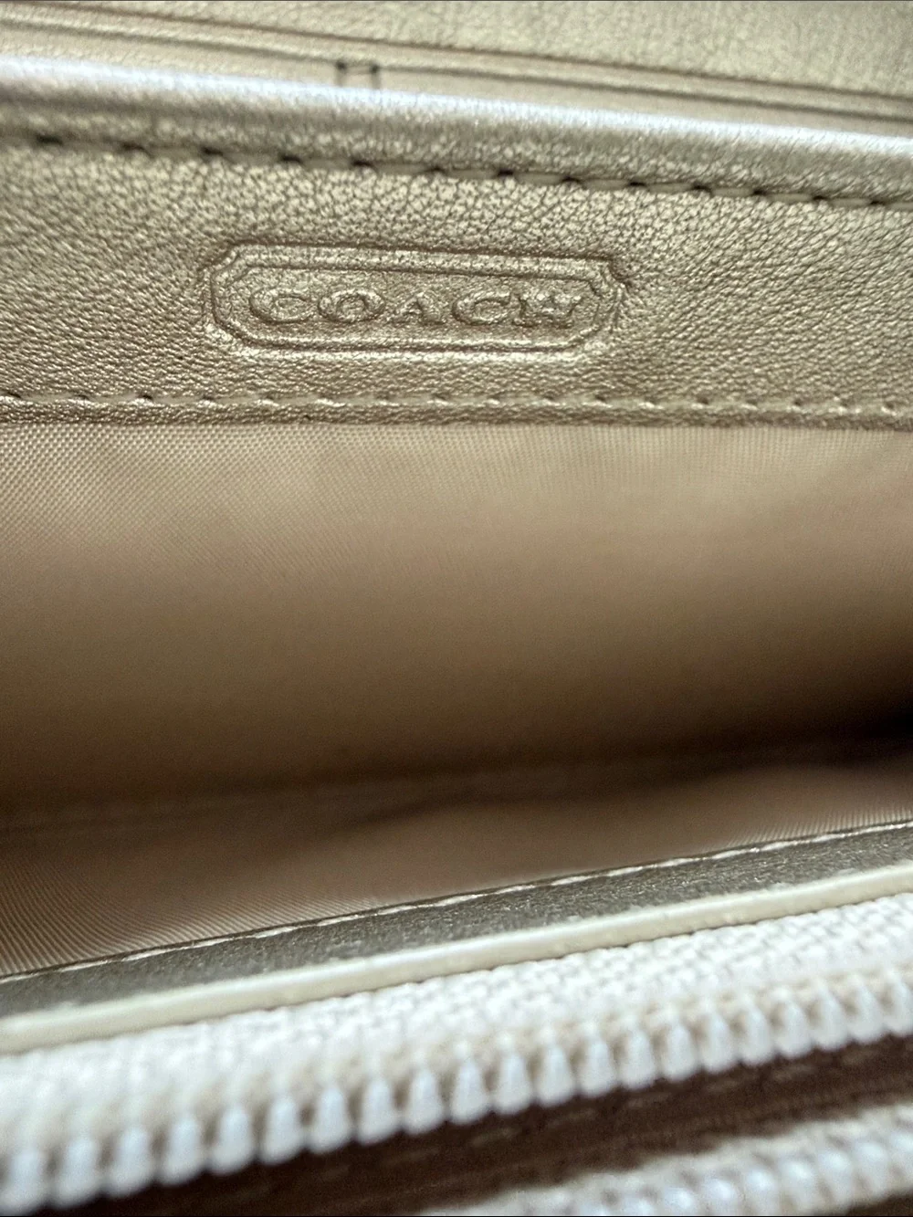 Coach sleek metallic